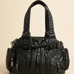 Borsa Donna Nera con Borchie ed Intrecci: Stile e Tendenza
