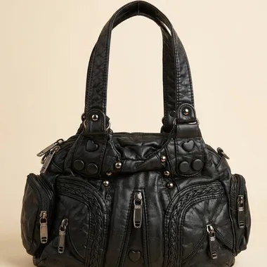 Borsa Donna Nera con Borchie ed Intrecci: Stile e Tendenza