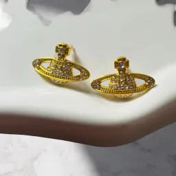 Orecchini Orbitali Dorati con Cristalli Arancioni