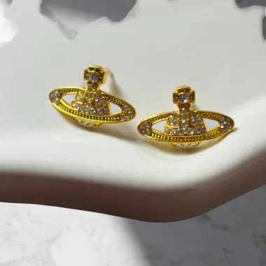 Orecchini Orbitali Dorati con Cristalli Arancioni